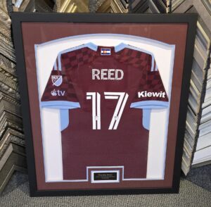 Colorado Rapids soccer jersey featuring the name Reed and number 17, professionally framed in a custom shadow box display.
